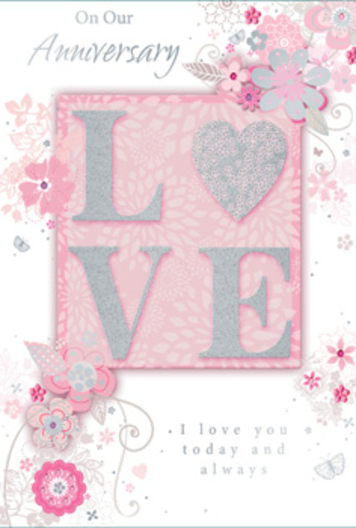 This anniversary card, viewed up close, reveals the same kind of quiet craftsmanship you might expect from a florist carefully building a romantic bouquet in a Highbury studio. At its heart lies the word "LOVE," rendered in bold yet soft-edged letters that are embossed for a distinctly three-dimensional feel. Each letter is traced with a fine dusting of blush and silver-toned glitter, giving off a gentle sparkle whenever it catches the light, similar to the sheen of petals misted with water before delivery around Highbury Barn. The central background deepens to a warm pink halo around the text, then effortlessly fades into a lighter, almost cloudy pink that fills the rest of the card, creating a sense of depth without any harsh lines. Framing this central motif is a delicate scattering of stylised blossoms, slender leaves, and curling vines. The floral artwork is highly detailed yet intentionally light, drawn in graceful, thin strokes with shades of blush, ivory, dove grey, and hints of shimmering silver. Each flower seems thoughtfully placed, echoing the balanced way roses, lisianthus, and foliage might be layered in an anniversary arrangement for a home near Highbury & Islington station. The vines arc and loop gently, sometimes forming partial frames around the word, other times simply drifting toward the margins of the card. At the bottom, a smooth, flowing script delivers a heartfelt anniversary message in soft grey or silver ink, its lines as fluid as handwriting in a cherished love letter. Altogether, the card radiates tender affection and timeless romance, a paper keepsake that quietly honours the beauty of a shared life and the comfort of being truly known and loved.